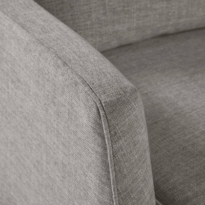 Gray Skirted Swivel Armchair with Lumbar Pillow