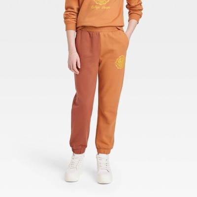 orange sweatpants in store