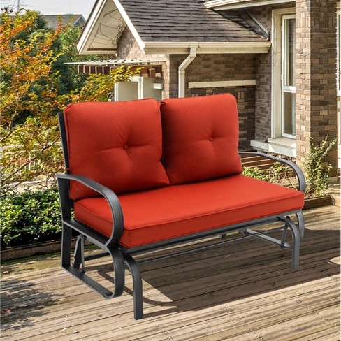 Outdoor rocking 2024 bench with cushions