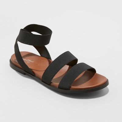 black elastic sandals