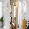 Celestia 2-Light Matte Black Wall Sconce with Antique Brass Accent Socket and Matte Opal Glass Shades - Globe Electric: ETL Listed, Dimmable - 2 of 4