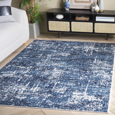 Ivory and Navy Abstract 8' x 10' Synthetic Area Rug