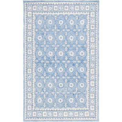 Ebony EBN651 Handmade Tufted Rug - Safavieh