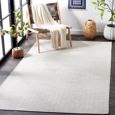Ivory and Multi 8' x 10' Hand-Knotted Wool and Synthetic Rug
