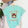 Simply Sage Market Women's Coquette Girl Who Loves Football Short Sleeve Garment Dyed Tee - 3 of 4