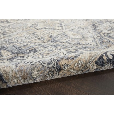 Navy and Beige Synthetic Rectangular 5' x 7' Area Rug