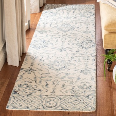 Hand-Tufted Blue Ivory Wool Splash Area Rug 27" x 8"