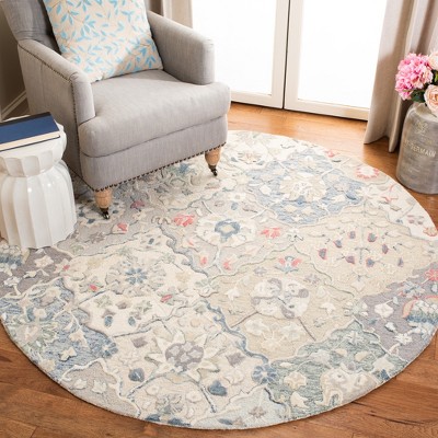 Hand-Tufted Ivory and Red Round Wool Area Rug