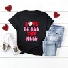 Simply Sage Market Women's Love Is All You Need Smiley Short Sleeve Graphic Tee - 3 of 4