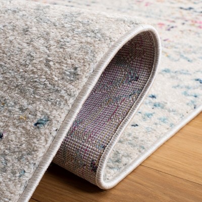 Ivory and Blue Geometric Round Synthetic Area Rug, 6' x 9'