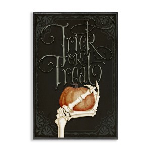 Stupell Industries Trick Or Treat Skeleton Hand Framed Giclee Art, Black, 16" x 24" - 1 of 4