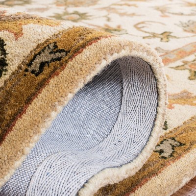 Handmade Gold and Brown Tufted Wool Oval Rug