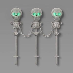21" Skeletons Fence Stakes Halloween Decorative Prop Off-White - Hyde and EEK! Boutique™ - 1 of 3