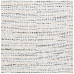 Ebony EBN810 Hand Tufted Indoor Rugs - Safavieh - 1 of 4