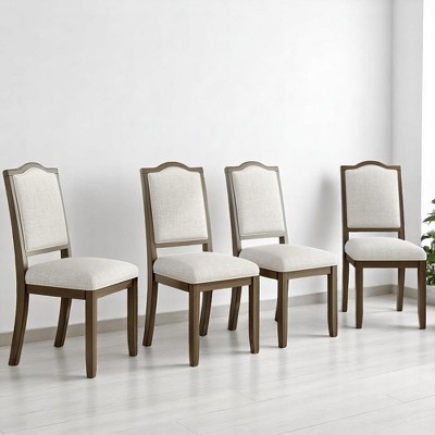 Lineup of five upholstered dining chairs in a row