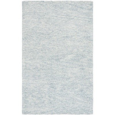 Ebony EBN950 Handmade Tufted Rug - Safavieh