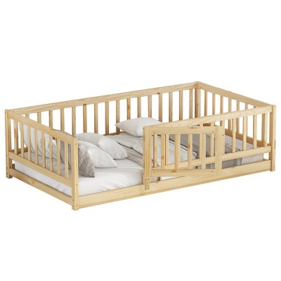 Side view of twin size floor bed with fence