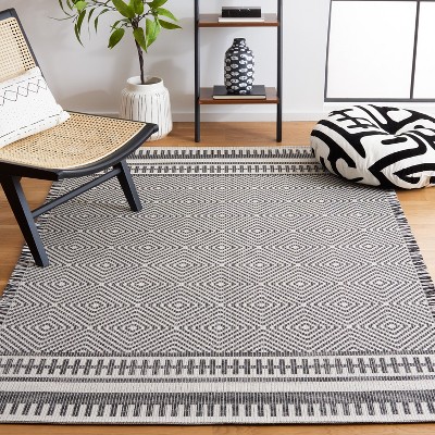 Ivory and Black Geometric Flat Woven Area Rug