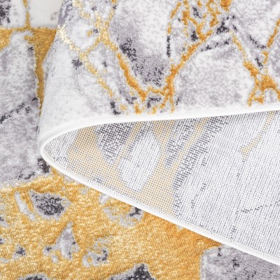 Ivory and Gold Modern Abstract 4' x 6' Synthetic Rug