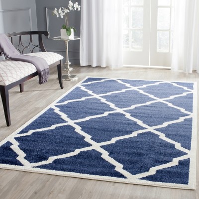 Navy and Beige Geometric 4' x 6' Synthetic Area Rug