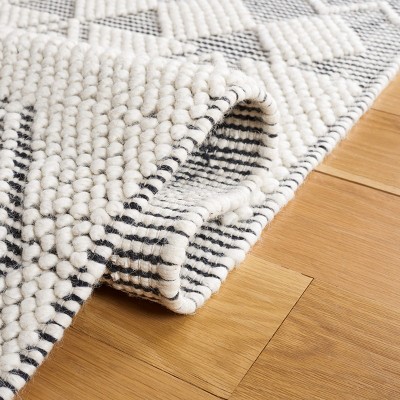 Black and Ivory Hand Tufted Wool 3' x 5' Area Rug