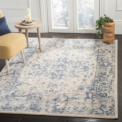 Ivory and Navy Rectangular Synthetic Area Rug