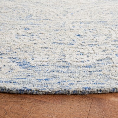 Ivory and Blue Hand-Tufted Wool Area Rug, 3' x 5'