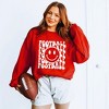 Simply Sage Market Women's Graphic Sweatshirt Football Smiley Face - 2 of 4
