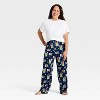 Women's The Grinch Print Fleece Holiday Matching Family Pajama Pants - 3 of 4
