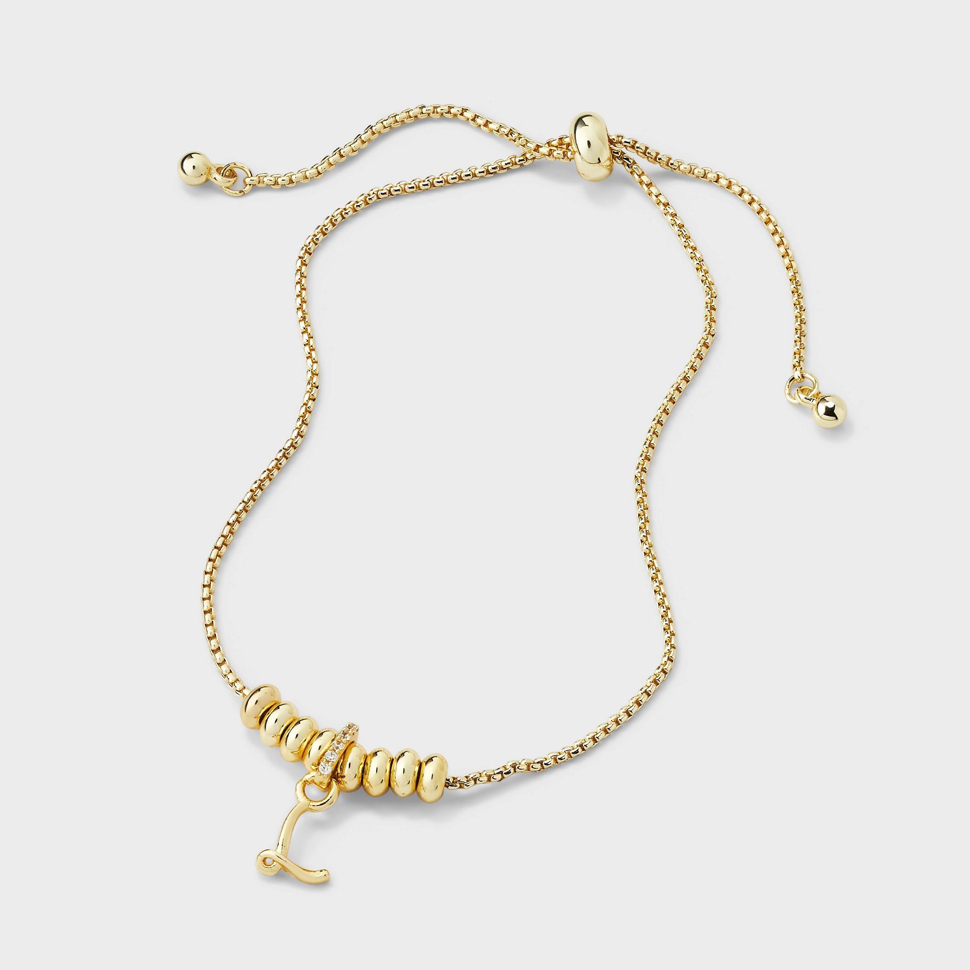 14k Gold Dipped Letter Twist Initial with Cubic Zirconia Bail Bolo Bracelet - A New Day™ Gold