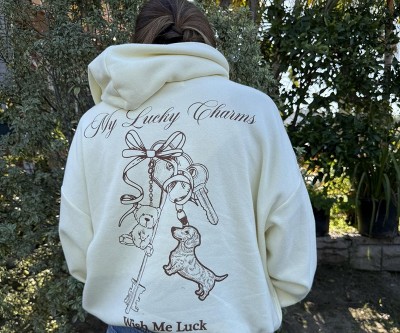 Women's Hooded Charms Graphic Pullover Sweatshirt - Light Yellow