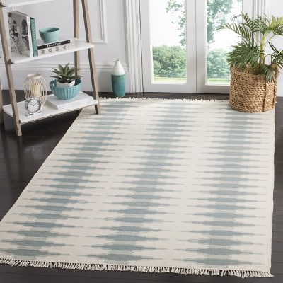Ivory and Blue Geometric Wool 5' x 8' Area Rug