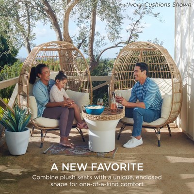 Beige Wicker Egg Chair with Navy Cushions