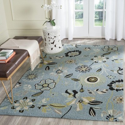 Handmade Blue Floral 5' x 7' Synthetic Area Rug
