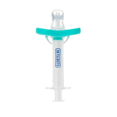 Baby deals medicine syringe