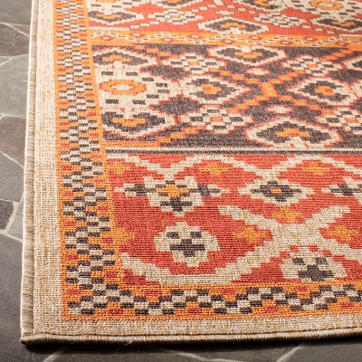 Red and Chocolate Rectangular Synthetic Indoor/Outdoor Area Rug