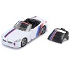 BMW Z4 M40i Cabriolet White with Black Top with Extra Wheels and Decals 1/50 Diecast Model by Siku - 2 of 4