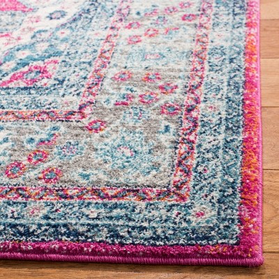 Fuchsia and Navy Synthetic Medallion Area Rug 5'1" x 7'6"