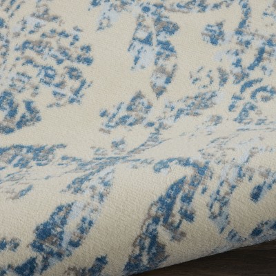 Elegant Ivory and Blue Damask 7' x 10' Synthetic Area Rug