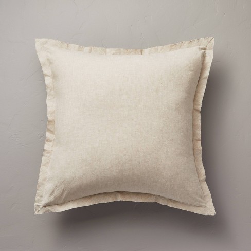 Beige bed online pillows