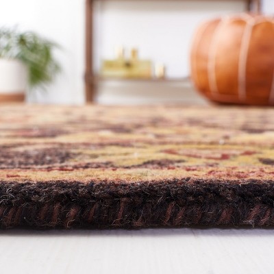 Antiquity Hand Tufted Wool Area Rug in Dark Plum and Gold