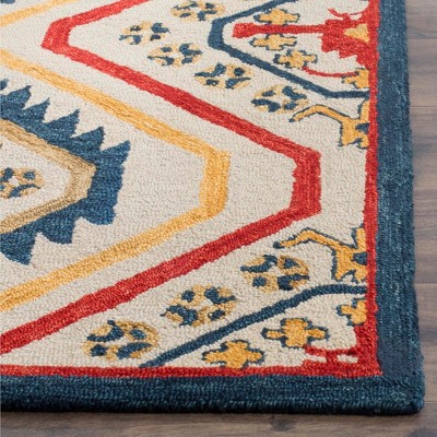 Handmade Ivory Wool Tufted Rectangular Rug - 2' x 3'