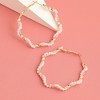 SOHI Women's Gold Twist Hoop Earrings - 2 of 3