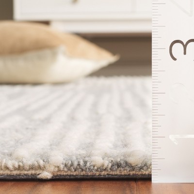 Handmade Light Grey and Ivory Wool Tufted Medium Rectangle Rug