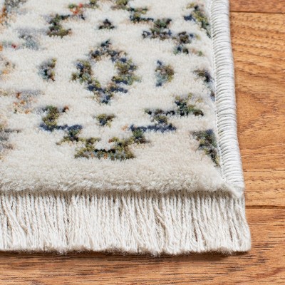 Elegant Ivory Oriental 4' x 6' Synthetic Area Rug