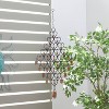 Eclectic Metal Abstract Windchime Brass/Black - Olivia & May - 2 of 4