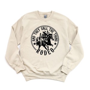 Simply Sage Market Women's Graphic Sweatshirt Call The Thing Rodeo Circle - 1 of 3