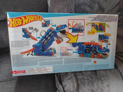 Hot Wheels City Ultimate Hauler, Transforms into a T-Rex with Race Track,  Stores 20+ Cars, 4Y+, Blue 