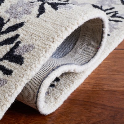 Empire Black and Ivory Hand-Tufted Wool Area Rug