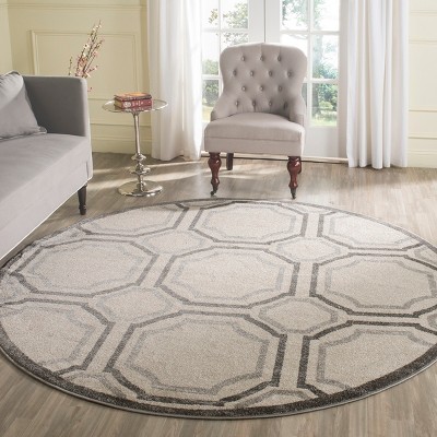 Ivory and Light Grey Round Synthetic Area Rug
